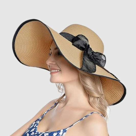 straw hat with black ribbon